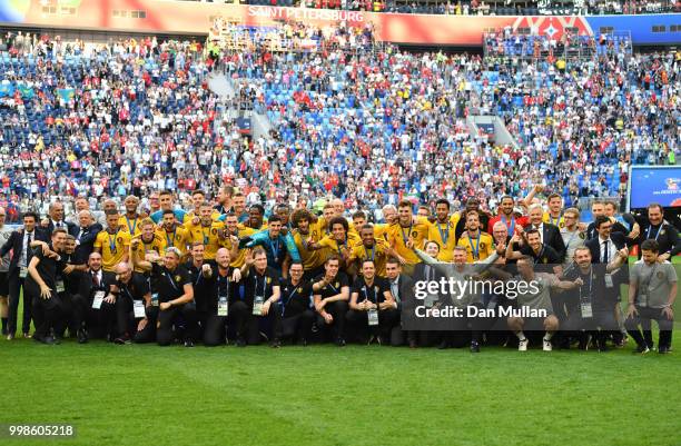 Belgium players pose for a photo after recieving their third place medals during the 2018 FIFA World Cup Russia 3rd Place Playoff match between...