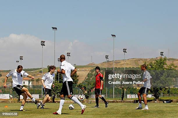 Players of Germany are exercise during the German National Team training session at Verdura Golf and Spa Resort on May 18, 2010 in Sciacca, Italy.