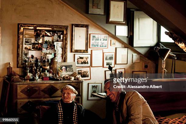 The artist Carol Rama meets the fashion designer Antonio Marras in her home on March 03, 2009 in Turin, Italy.