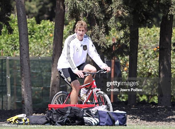 Stefan Kiessling of Germany rides a bike prior to the German National Team training session at Verdura Golf and Spa Resort on May 18, 2010 in...
