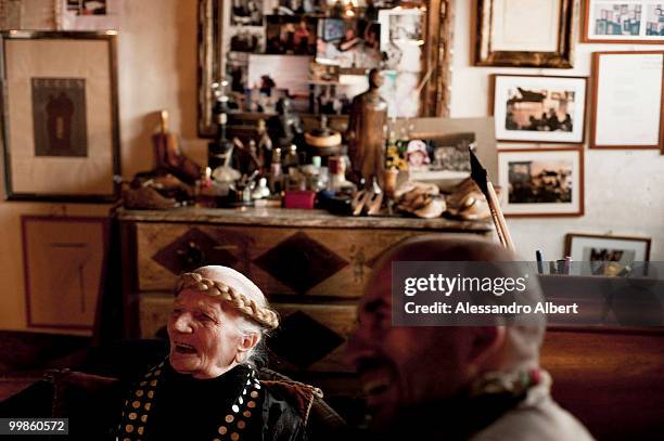 The artist Carol Rama meets the fashion designer Antonio Marras in her home on March 03, 2009 in Turin, Italy.