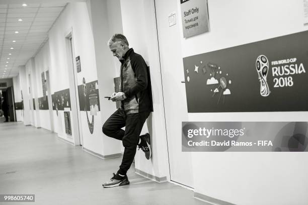 Didier Deschamps, Manager of France waits outside prior to a France press conference ahead of the 2018 FIFA World Cup Russia Final match between...