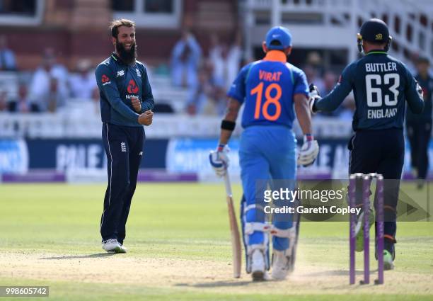 Moeen Ali of England celebrates dismissing India captain Virat Kohli during the 2nd ODI Royal London One-Day match between England and India at...