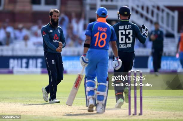 Moeen Ali of England celebrates dismissing India captain Virat Kohli during the 2nd ODI Royal London One-Day match between England and India at...