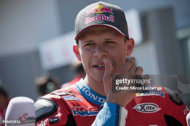 Stefan Bradl of Germany and EG 00 Marc VDS looks on in front of box at end of the qualifying practice during the MotoGp of Germany - Qualifying at...