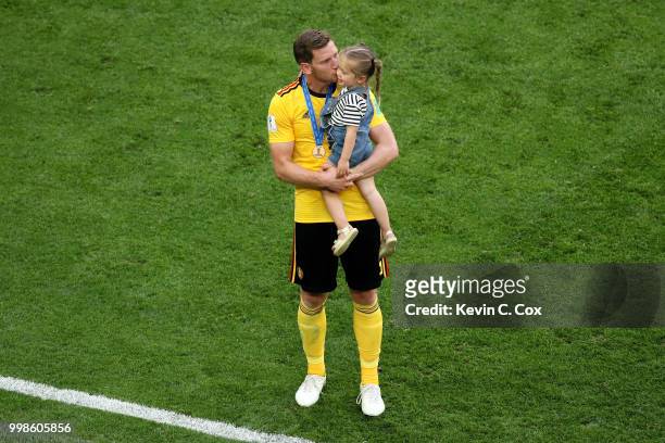 Jan Vertonghen of Belgium celebrates with his daughter following his sides victory in the 2018 FIFA World Cup Russia 3rd Place Playoff match between...