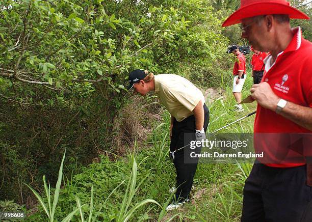 Ernie Els of South Africa loses his ball on the 15th hole causing him to drop a shot during the second round of the Holden Australian Open Golf...