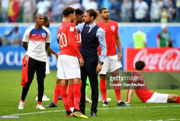 Gareth Southgate, Manager of England speaks with Dele Alli of England following their sides defeat in the 2018 FIFA World Cup Russia 3rd Place...
