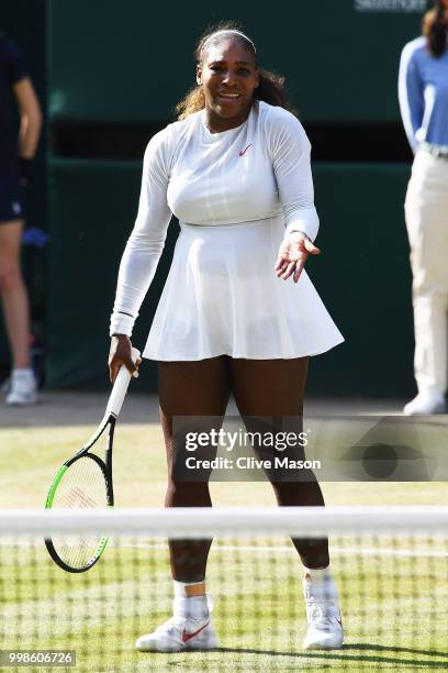 Serena Williams of The United States protests during the Ladies' Singles final against Angelique Kerber of Germany on day twelve of the Wimbledon...