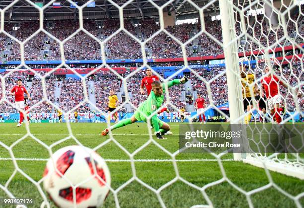 Eden Hazard of Belgium scores Jordan Pickford of England his team's second goal during the 2018 FIFA World Cup Russia 3rd Place Playoff match between...