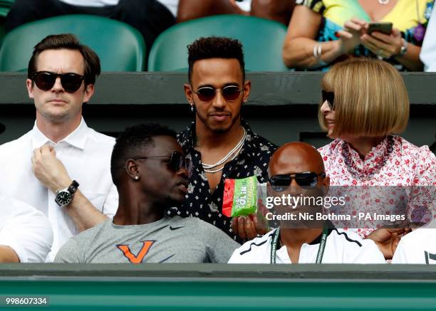 Lewis Hamilton and Anna Wintour in the players box on centre court on day twelve of the Wimbledon Championships at the All England Lawn Tennis and...