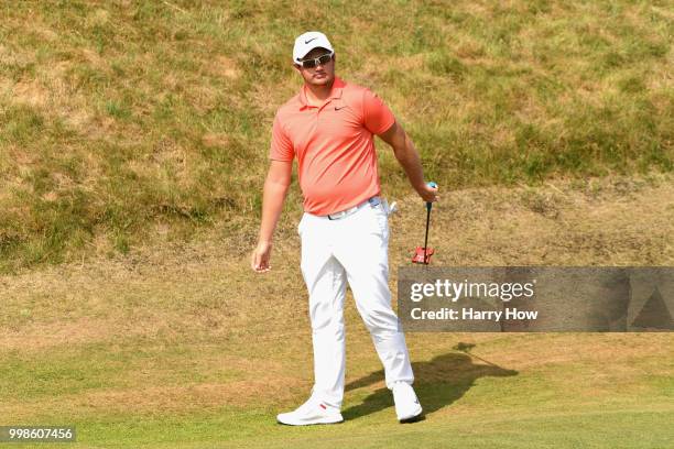 Sam Horsfield of England reacts to a birdie putt on hole one during day three of the Aberdeen Standard Investments Scottish Open at Gullane Golf...