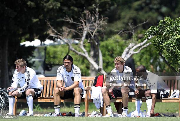 Toni Kroos, Sami Khedira, Stefan Kiessling and Cacau of Germany are seen prior to the German National Team training session at Verdura Golf and Spa...