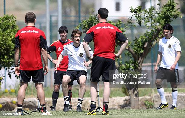 Arne Friedrich of Germany is running during the German National Team training session at Verdura Golf and Spa Resort on May 18, 2010 in Sciacca,...