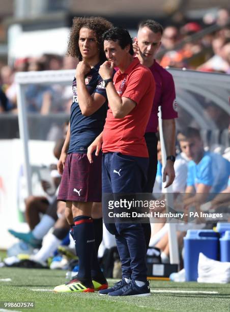 Arsenal manager Unai Emery prepares to bring on Matteo Guendouzi during the pre-season match at Meadow Park, Boreham Wood.