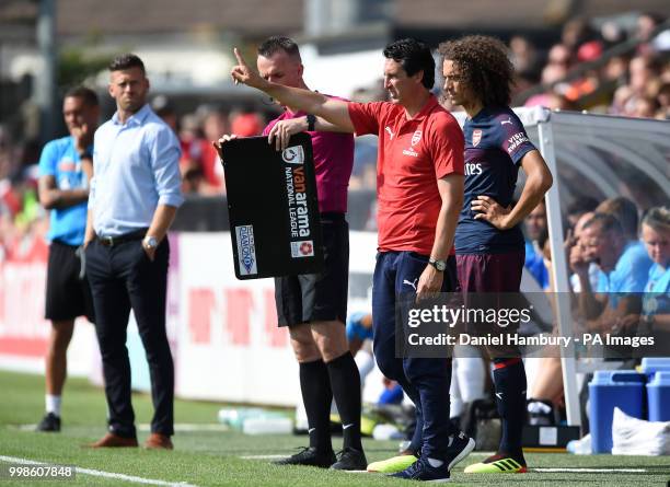 Arsenal manager Unai Emery prepares to bring on Matteo Guendouzi during the pre-season match at Meadow Park, Boreham Wood.