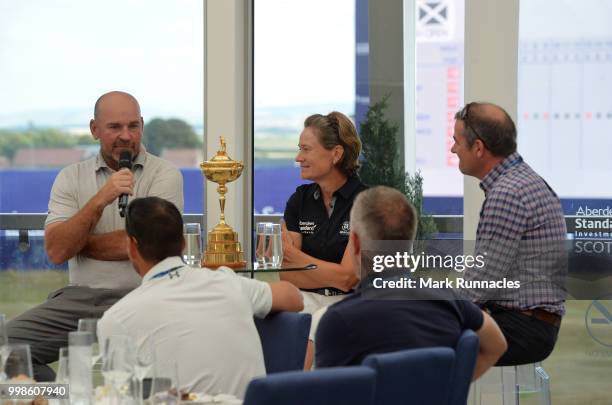 Ryder Cup Captain Thomas Bjorn of Denmark , with Solheim Cup Captain Catriona Matthew of Scotland during an interview with Ian Carter of the BBC , on...