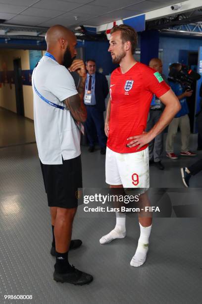 Harry Kane of England talks to Belgium assistant manager Thierry Henry following the 2018 FIFA World Cup Russia 3rd Place Playoff match between...