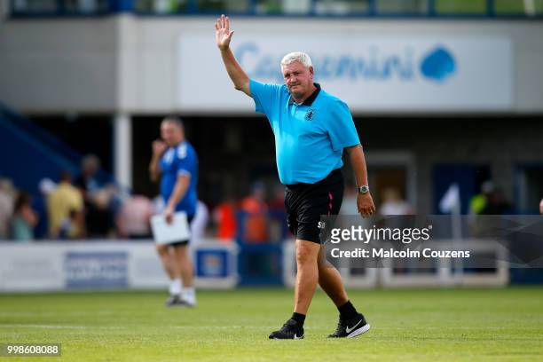 Aston Villa manager Steve Bruce acknowledges the supporters following the Pre-season friendly between AFC Telford United and Aston Villa at New Bucks...