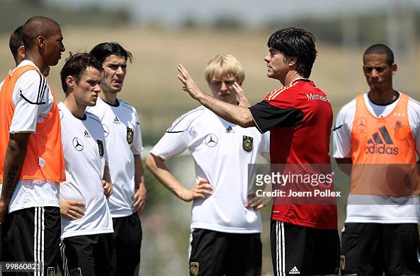 Head coach Joachim Loew of Germany gives instructions to the players during the German National Team training session at Verdura Golf and Spa Resort...