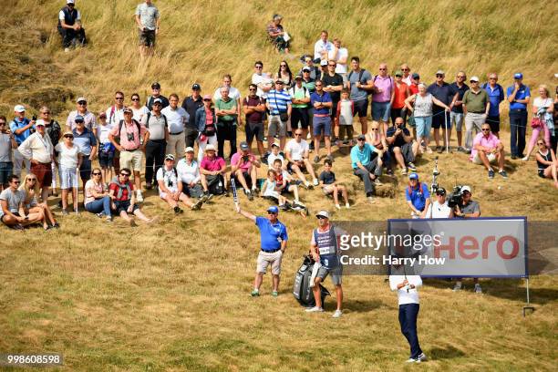 Rickie Fowler of USA plays out of the rough on hole one during day three of the Aberdeen Standard Investments Scottish Open at Gullane Golf Course on...