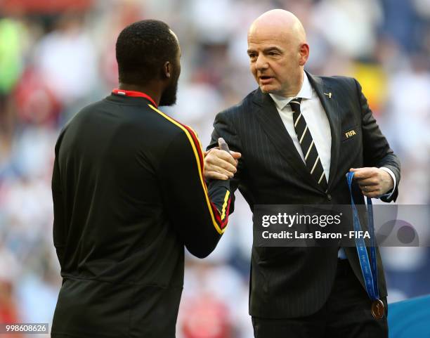 President, Gianni Infantino, awards Romelu Lukaku of Belgium with his third place medal after the 2018 FIFA World Cup Russia 3rd Place Playoff match...