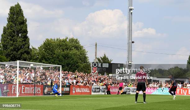 Pierre-Emerick Aubameyang scores his 3rd goal from the penalty spot during the match between Borehamwood and Arsenal at Meadow Park on July 14, 2018...