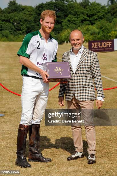 Prince Harry, Duke of Sussex and Sergio Momo attend the Xerjoff Royal Charity Polo Cup 2018 on July 14, 2018 in Newbury, England.