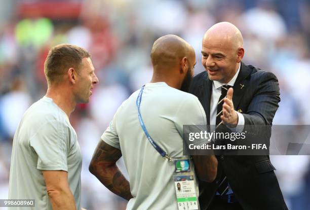 President, Gianni Infantino, awards Belgium Assistant Coach, Thierry Henry with his third place medal after the 2018 FIFA World Cup Russia 3rd Place...