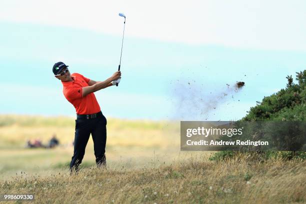 Haotong Li of China takes his second shot on hole four during day three of the Aberdeen Standard Investments Scottish Open at Gullane Golf Course on...