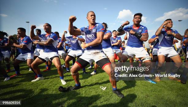 Players of Samoa perform the Siva Tau after defeating Germany in their Rugby World Cup 2019 qualifying match on July 14, 2018 in Heidelberg, Germany.