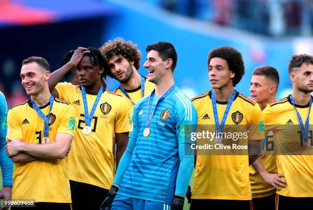 Thomas Vermaelen, Dedryck Boyata, Marouane Fellaini, Thibaut Courtois and Axel Witsel of Belgium celebrate victory following the 2018 FIFA World Cup...
