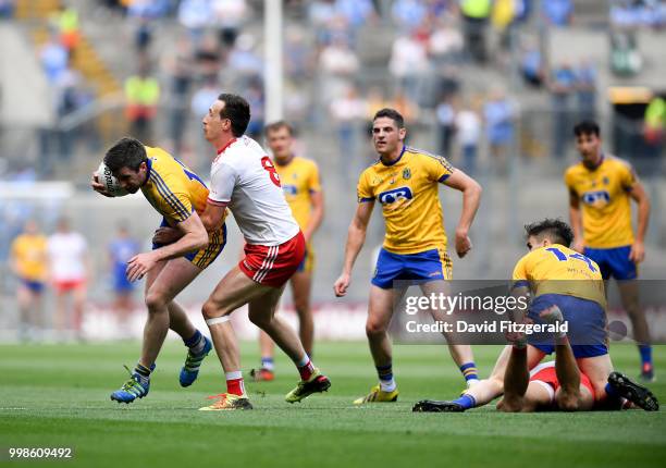 Dublin , Ireland - 14 July 2018; Cathal Cregg of Roscommon in action against Colm Cavanagh of Tyrone during the GAA Football All-Ireland Senior...