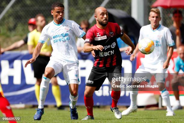 Armando Obispo of PSV, Frederic Nimani of Neuchatel Xamax FCS during the Club Friendly match between PSV v Neuchatel Xamax FCS on July 14, 2018 in...