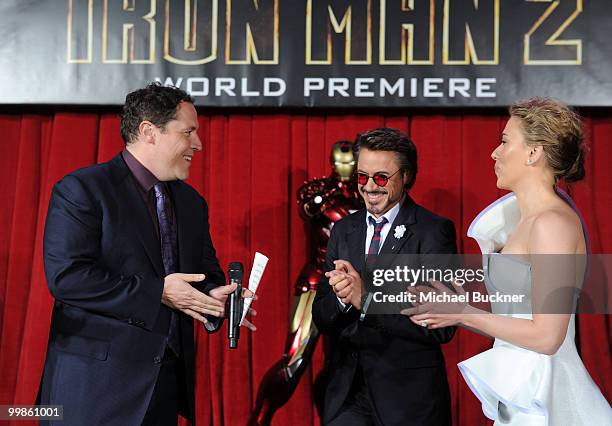 Director/Executive Producer Jon Favreau, actor Robert Downey Jr. And actress Scarlett Johansson arrive at the world wide premiere of "Iron Man 2"...