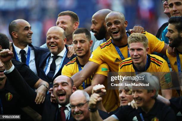 Vincent Kompany of Belgium celebrates with team mates and staff during the 2018 FIFA World Cup Russia 3rd Place Playoff match between Belgium and...