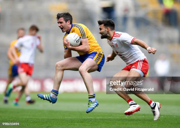 Dublin , Ireland - 14 July 2018; Cathal Cregg of Roscommon in action against Tiernan McCann of Tyrone during the GAA Football All-Ireland Senior...