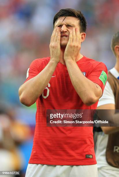 Harry Maguire of England wipes his face after the 2018 FIFA World Cup Russia 3rd Place Playoff match between Belgium and England at Saint Petersburg...