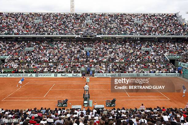 General view of the central court Philippe Chatrier taken during the Benny Berthet exhibition match between Spain's Rafael Nadal and Argentinian Juan...