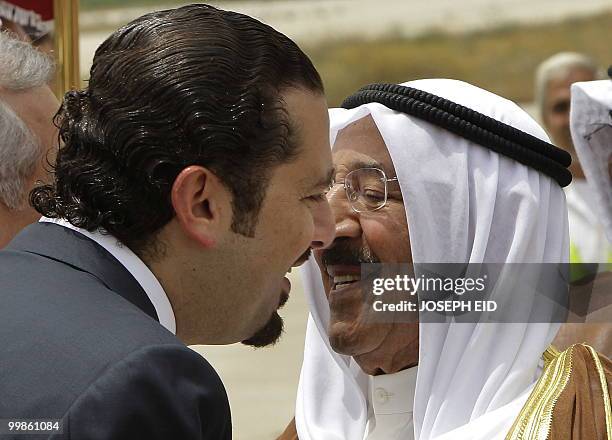 Lebanese President Saad Hariri greets Kuwaiti Emir Sheikh Sabah Ahmed al-Sabah during an arrival ceremony for the Kuwaiti Emir at Beirut...