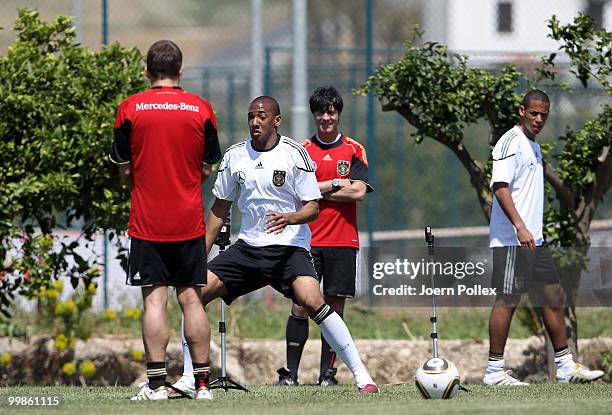 Jerome Boateng of Germany is running during the German National Team training session at Verdura Golf and Spa Resort on May 18, 2010 in Sciacca,...