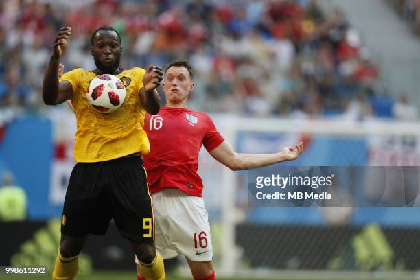Romelu Lukaku of Belgium and Phil Jones of England compete for the ball during the 2018 FIFA World Cup Russia 3rd Place Playoff match between Belgium...