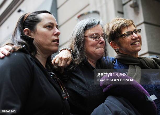 Cindy Hickey , Nora Shourd and Laura Fattal , mothers of the US hikers being held in Iran, speak to the media before leaving to the airport May 18,...