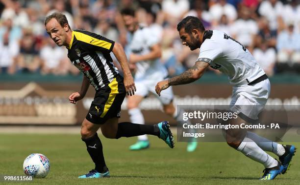 Notts County's David Vaughn and Derby County's Bradley Johnson during the pre-season match at Meadow Lane, Nottingham.