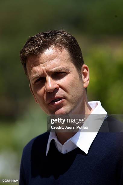 Team manager Oliver Bierhoff of Germany talks to the media during a press conference at Verdura Golf and Spa Resort on May 18, 2010 in Sciacca, Italy.