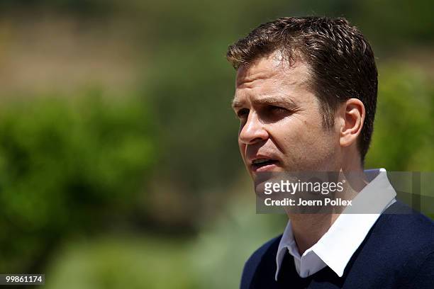 Team manager Oliver Bierhoff of Germany talks to the media during a press conference at Verdura Golf and Spa Resort on May 18, 2010 in Sciacca, Italy.