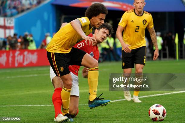 Axel Witsel of Belgium battles with Harry Maguire of England during the 2018 FIFA World Cup Russia 3rd Place Playoff match between Belgium and...