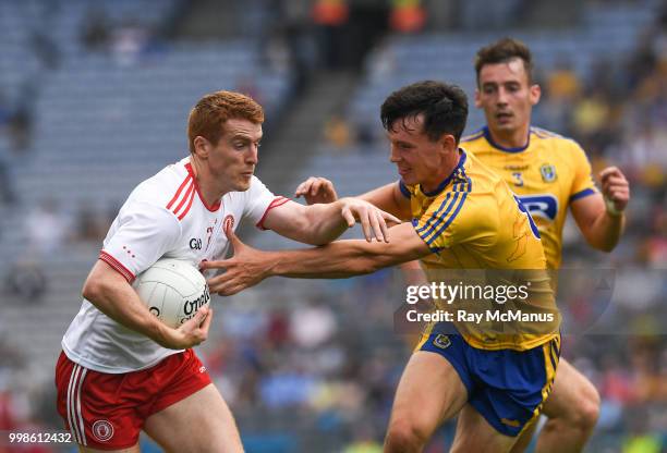 Dublin , Ireland - 14 July 2018; Peter Harte of Tyrone in action against Tadhg O'Rourke of Roscommon during the GAA Football All-Ireland Senior...