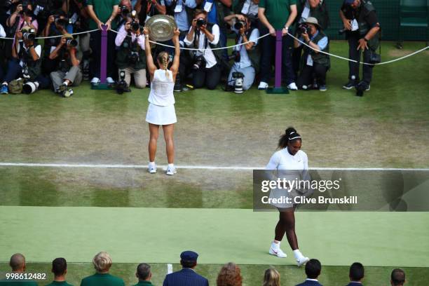 Serena Williams of The United States smiles as winner Angelique Kerber of Germany poses for photographs with the Venus Rosewater Dish after the...