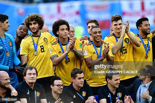 Belgium's midfielder Marouane Fellaini, Belgium's midfielder Axel Witsel, Belgium's midfielder Youri Tielemans, Belgium's defender Thomas Meunier and...